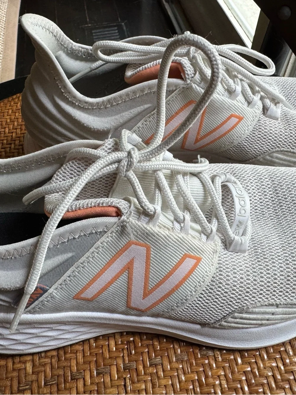 New Balance Women’s White Sneakers with Coral Accents